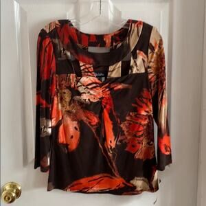 Nueva NWT women’s size 10 travel knit top